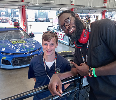 Christopher Woody with NASCAR driver Joey Gase
